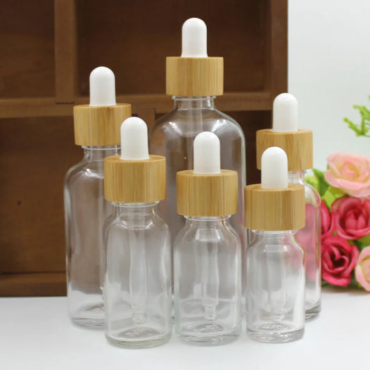 Essential Oil Dropper Bottles for Cosmetic Skin Care 5ML-100ML Glass Pipette Container Packaging with Bamboo Lid Dropper Bottle